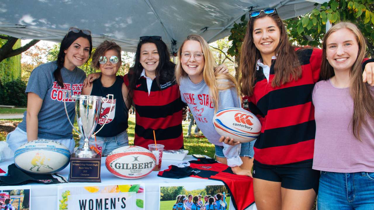 KSC Women's Rugby Team together at a table during Student Involvement Fair