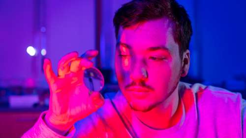 Precision Optics Student with lens